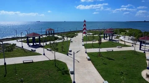 Seaside Park with Lighthouse and Ocean View Stock Footage 306893393