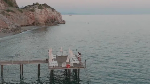 Seaside Pier with Cliff View at Sunrise Stock Footage 282929913
