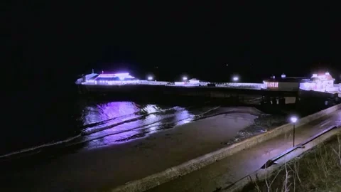 Seaside pier at night 스톡 동영상 258823831