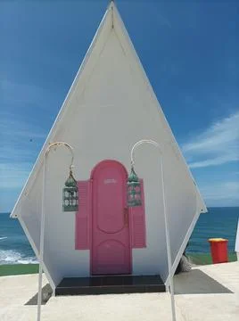 Seaside Sanctuary: A Triangular Beach Hut Stock Photos