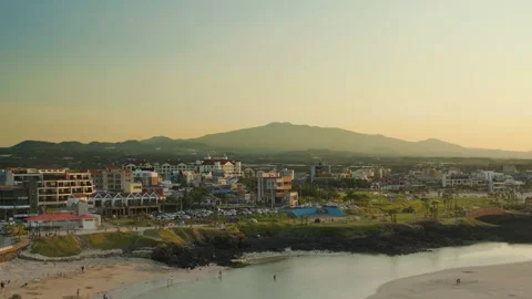The seaside scenery at sunset with a view of Halla Mountain. Stock Footage 140259446