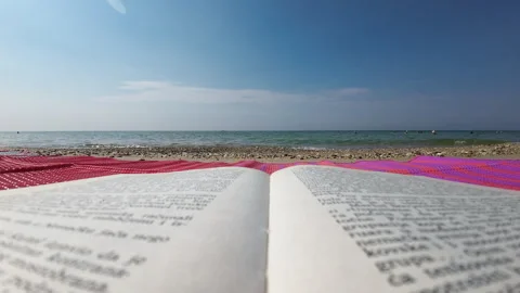 Seaside Serenity: Open Book with a View to sea waves Stock Footage 250469533