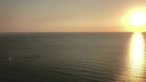 Seaside on sunset time. Beautiful orange seascape horizon line Stock Footage 235610541