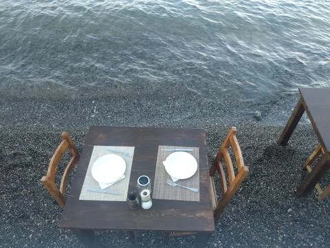 Seaside Taverna Table for Two on a Cretan Beach Stock Photos
