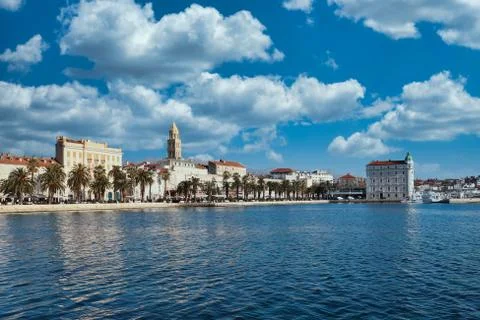 Seaside view of the town of Split, Croatia. Riviera with trees and the old to Stock Photos