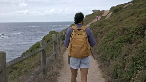 Seaside Wanderlust: Exploring the Coastal Path Stock Footage 260836976