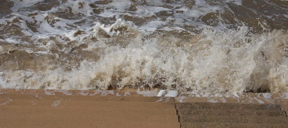 Seaside Waves Lapping on Steps Stock Photos
