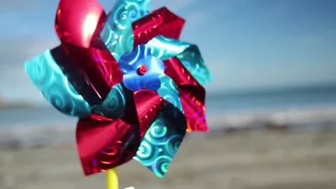 Seaside windmill &amp; breaking surf Stock Footage 73713415