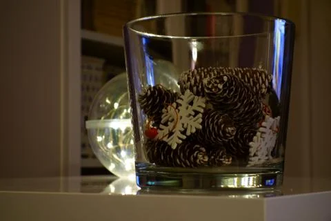 Season decorations in a glass bowl Stock Photos