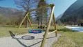 Off-season at resort, mountains, no tourists, empty playground, melting snow 4k or 4k+ Resolution
