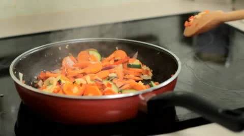 Season vegetables in the pan Stock Footage 14920717