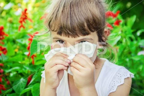 Seasonal allergy in a child. Coryza. Selective focus. Stock Photos