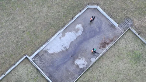 Seasonal Grounds Crew Using Leaf Blower Aerial Footage Stock Footage 127260532
