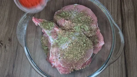 Seasoning Added To Pork Vidéo 166703254