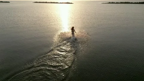 Seasunset swimming Video stock 208306568
