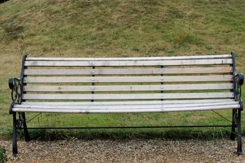 Seat on the edge of a path Stock Photos