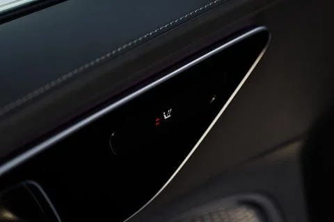Seat heating controller buttons close up view. Car interior. Seat heater butt Stock Photos