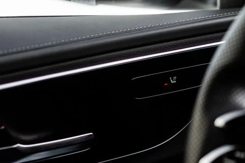Seat heating controller buttons close up view. Car interior. Seat heater butt Stock Photos