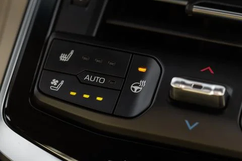 Seat heating controller buttons close up view. Car interior. Seat heater butt Stock Photos