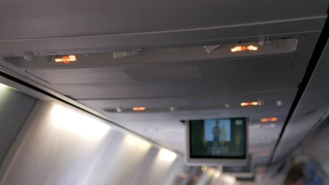 Seatbelt Sign Bumpy Flight Stock-Footage 89342618