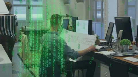 Seated architect reviewing plan in office colleague crossing causing green Stock Footage 335316750
