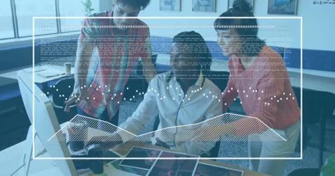 Seated designer moving mouse animating icons on screen colleagues finalizing Stock Footage 310971368