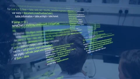 Seated developer operating workstation, initiating floating green code overlay 스톡 동영상 330602264