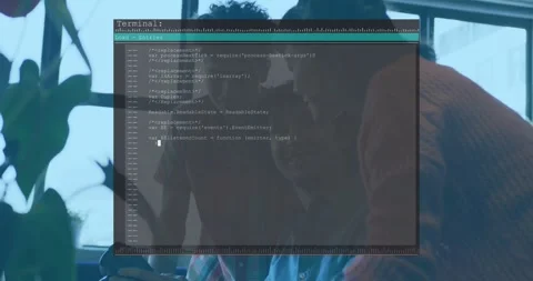 Seated developer tapping device, team leaning in, terminal overlay filling with Stock Footage 330936216
