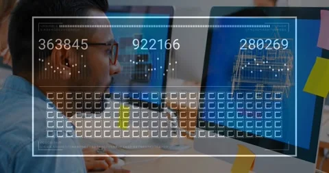 Seated engineer leaning toward screen, checking CAD while HUD appearing, cycling Stock Footage 330356084