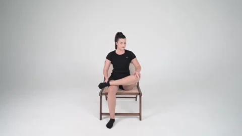 Seated glute stretch Stock Footage 314195693