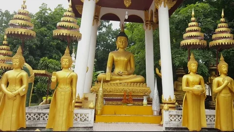 Seated golden Buddha statue, shrine, standing Buddhas, Sisaket Museum, Vientiane Vídeos de archivo 75556341