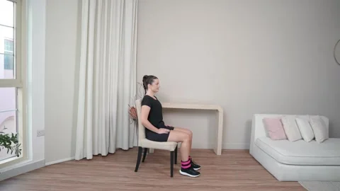 Seated Knee Extension with Ankle Weights Stock Footage 314188365