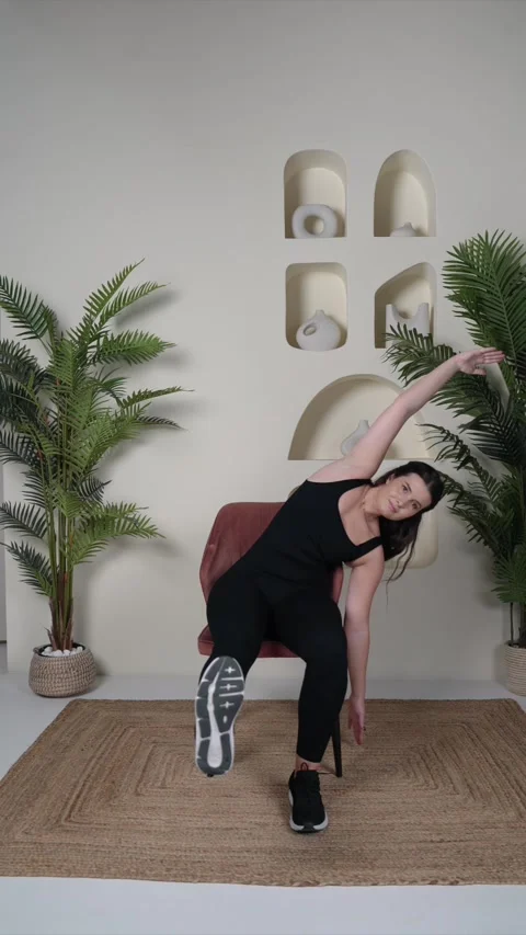 Seated Leg Extensions with Side Reach Stock Footage 314187393