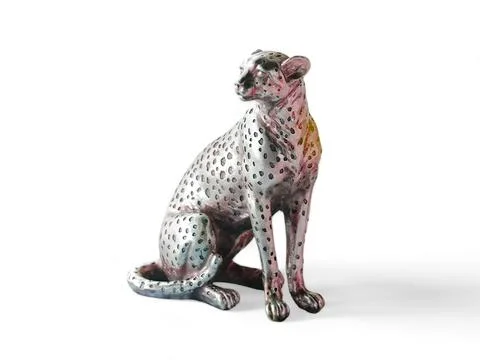 A seated leopard statue in silver on a white background Stock Photos