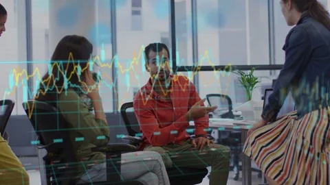 Seated man pointing and explaining, initiating data review while charts Stock Footage 334729328