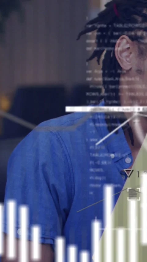 Seated man turning right while timeline advancing, code and charts overlaying Stock Footage 331721406
