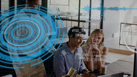 Seated man typing and pointing at laptop initiating HUD showing business data Stock Footage 333155082