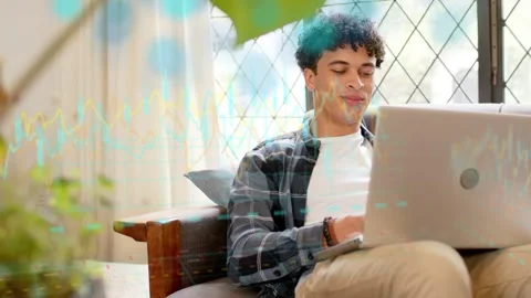 Seated man typing on laptop for tech project by diamond window, activating Stock Footage 333803457