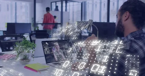 Seated man waving in remote call while laptop starting binary overlay hiding Stock Footage 329470525