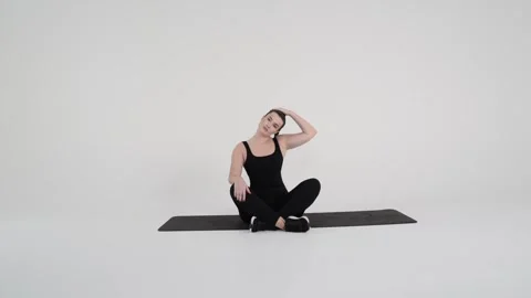Seated Neck Side Stretch Stock Footage 314193964