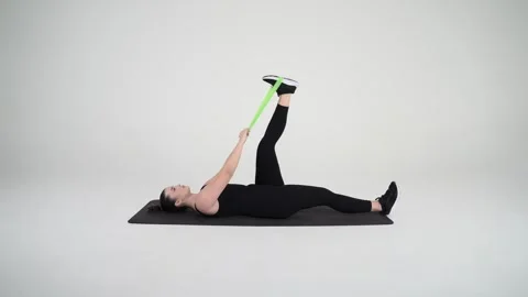 Seated resistance Band hamstring stretch Stock Footage 314192548