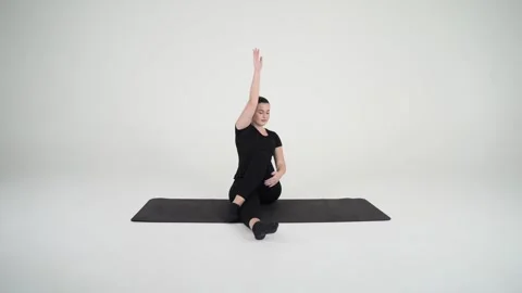 Seated Spine Twist Stock Footage 314194813