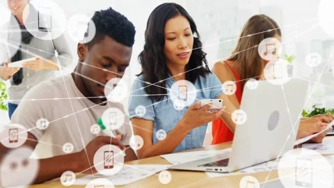 Seated team writing calling typing as app loading network icons growing over Stock Footage 334178431