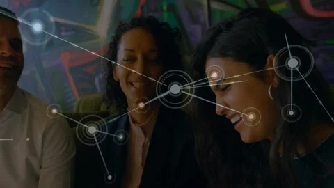 Seated trio reacting while mobile alert starting HUD network expanding, showing Stock Footage 331062745