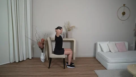 Seated Trunk Thoracic Extension with Hands Behind Neck Stock Footage 314188853