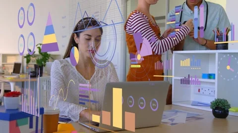 Seated woman typing, team testing device causing bar-pie charts shifting over Stock Footage 333704815