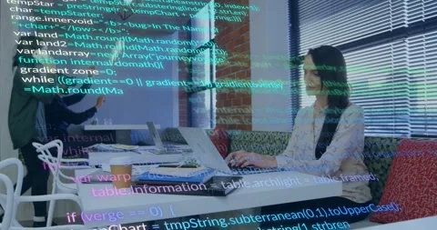 Seated woman typing while man donning VR headset activating falling code overlay Stock Footage 334036756