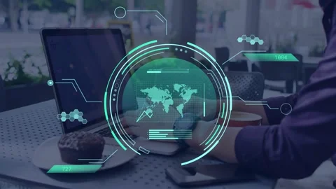 Seated worker leaning over laptop, typing while HUD fading in over hands Stock Footage 335731915