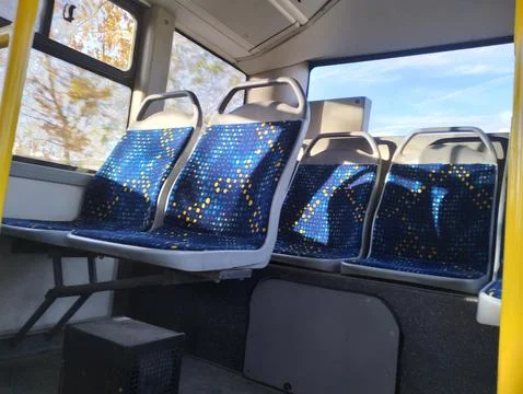 Seating area inside the Bus transport Stock Photos
