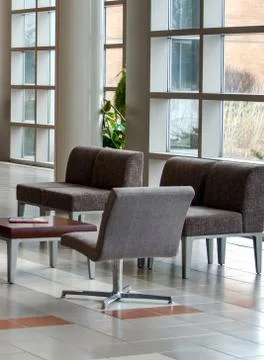 Seating area in a open lobby Stock Photos